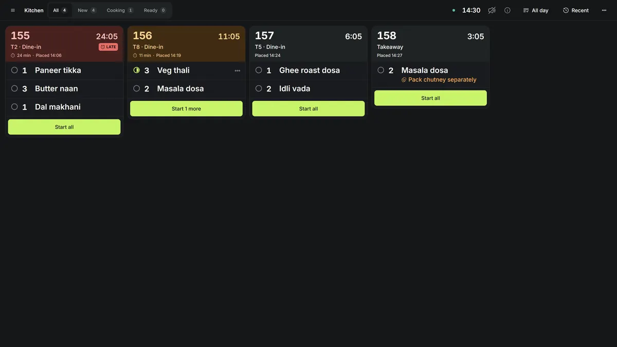 The kitchen display: order tickets in columns with their items and timers; one ticket is marked late.